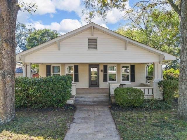 bungalow-style home featuring covered porch