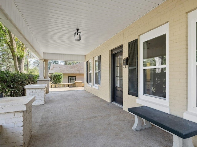 view of patio featuring a porch