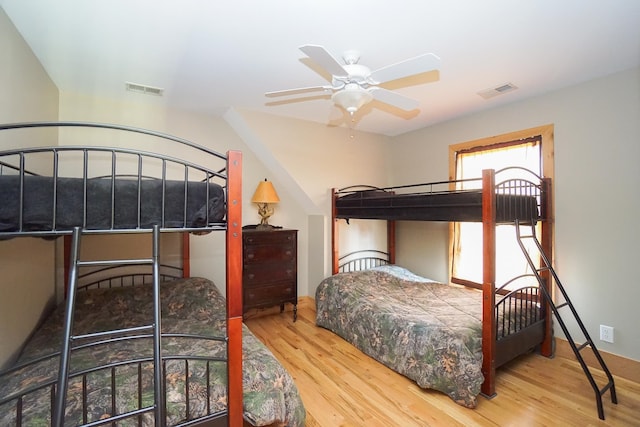 bedroom featuring ceiling fan and hardwood / wood-style flooring