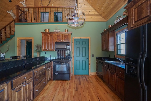 kitchen with sink, black appliances, wooden ceiling, an inviting chandelier, and light wood-type flooring