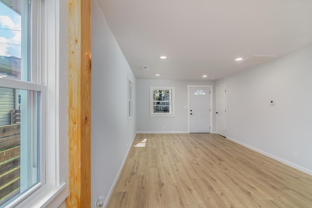 entrance foyer with light hardwood / wood-style floors