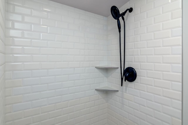 details featuring a tile shower