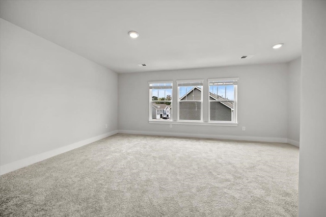 view of carpeted spare room