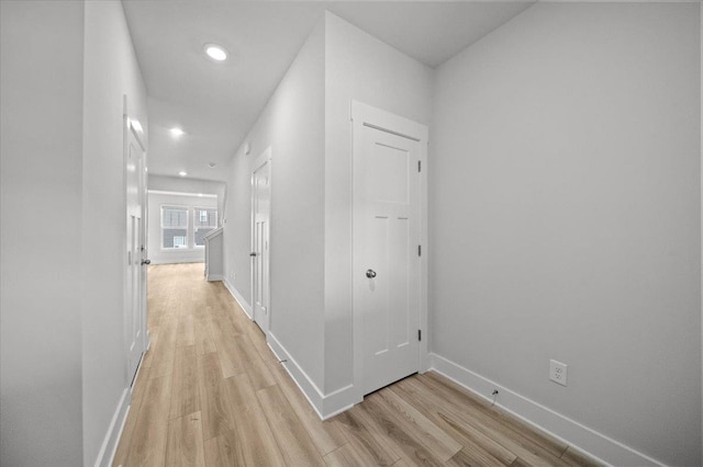 hallway featuring light hardwood / wood-style flooring