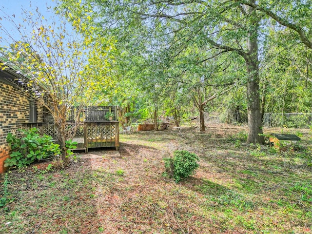 view of yard featuring a deck