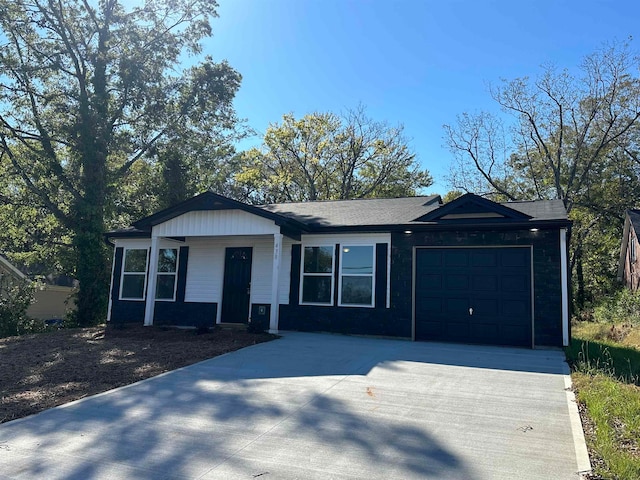 ranch-style home with a garage