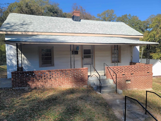 bungalow featuring covered porch