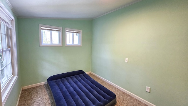 living area featuring ornamental molding, lofted ceiling, and carpet floors