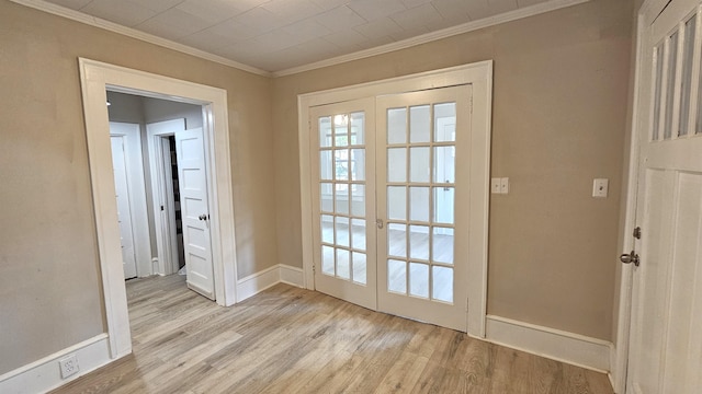 doorway to outside featuring french doors, light hardwood / wood-style flooring, and crown molding