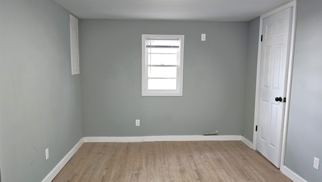 unfurnished room featuring light wood-type flooring