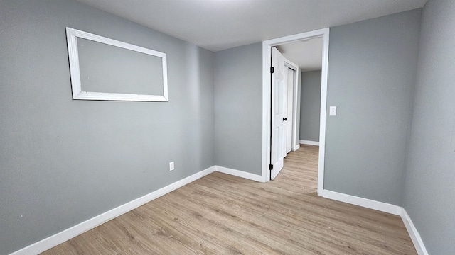 empty room featuring light hardwood / wood-style floors