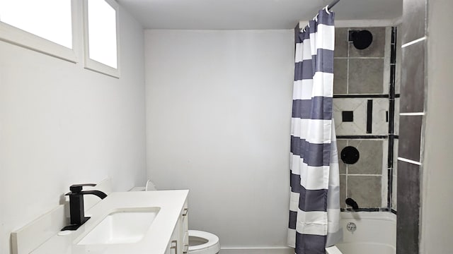 full bathroom featuring vanity, toilet, and shower / bathtub combination with curtain