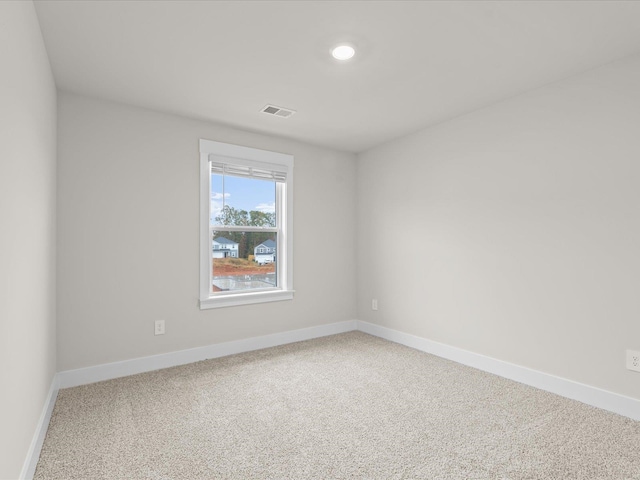 view of carpeted spare room