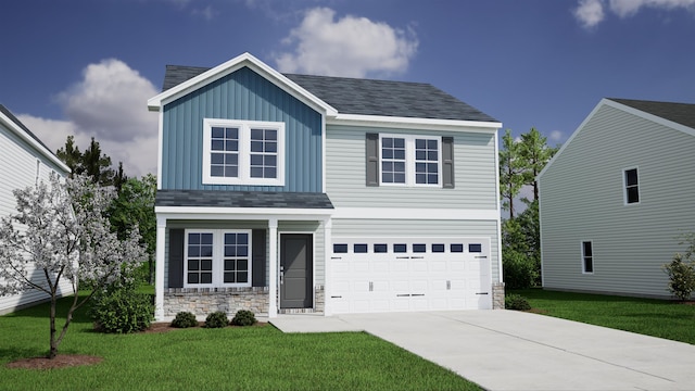 view of front of property featuring a front yard and a garage