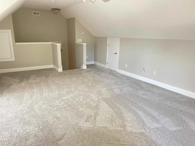 bonus room featuring ceiling fan, carpet, and lofted ceiling