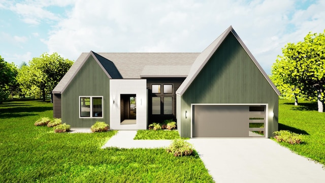 view of front of home with a front yard and a garage