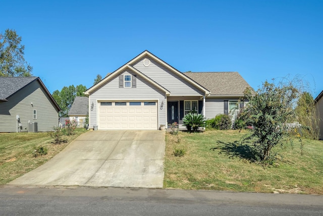 view of front of property with a garage, a front lawn, and central air condition unit