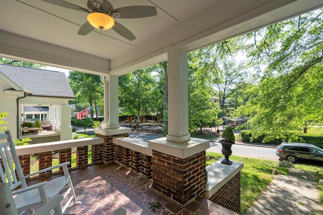 view of patio featuring covered porch and ceiling fan