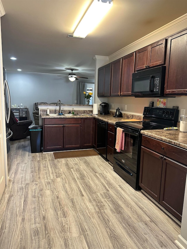 kitchen featuring black appliances, sink, kitchen peninsula, ceiling fan, and crown molding