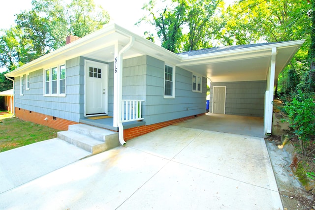 single story home featuring a carport