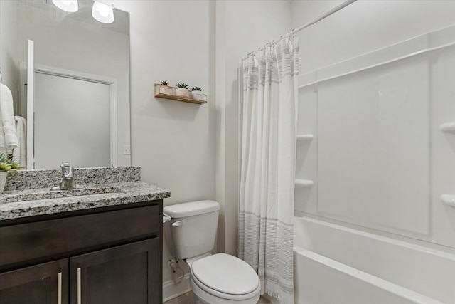 full bathroom featuring vanity, shower / tub combo with curtain, and toilet