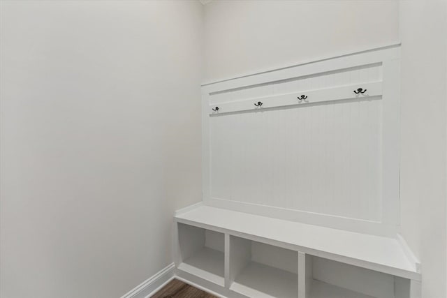 mudroom with dark hardwood / wood-style flooring