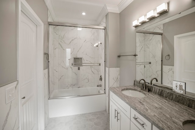 bathroom featuring vanity, ornamental molding, shower / bath combination with glass door, and tile patterned floors