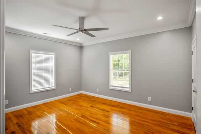 unfurnished room featuring crown molding, hardwood / wood-style flooring, and ceiling fan