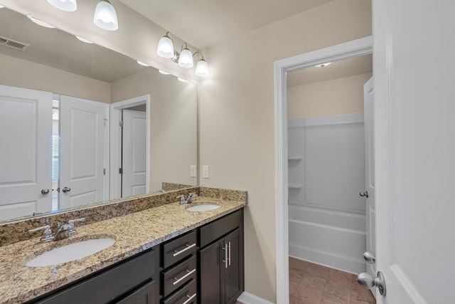 bathroom featuring vanity and separate shower and tub