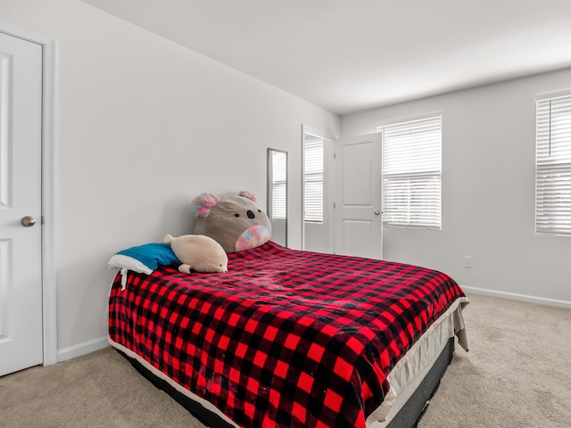 bedroom featuring carpet flooring