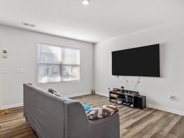 living room with hardwood / wood-style flooring