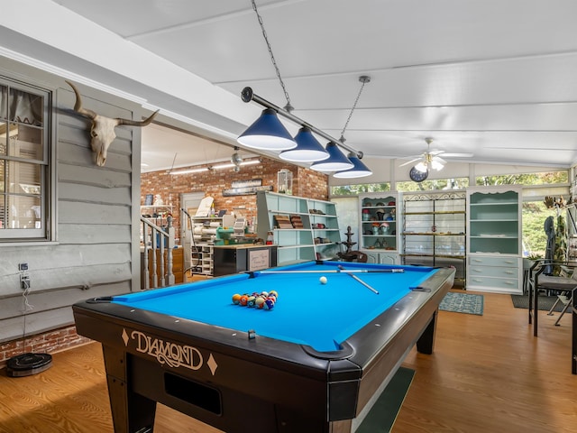 recreation room featuring billiards, brick wall, wood-type flooring, and ceiling fan