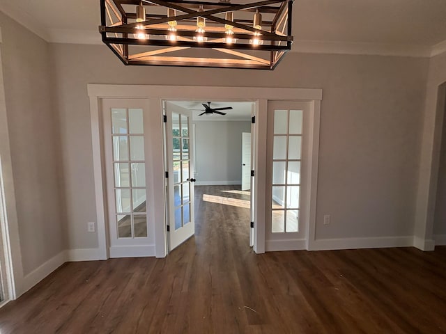 doorway to outside featuring french doors, ornamental molding, and dark hardwood / wood-style flooring