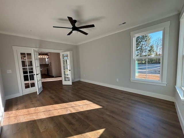 unfurnished living room with french doors, ceiling fan, ornamental molding, and dark hardwood / wood-style flooring