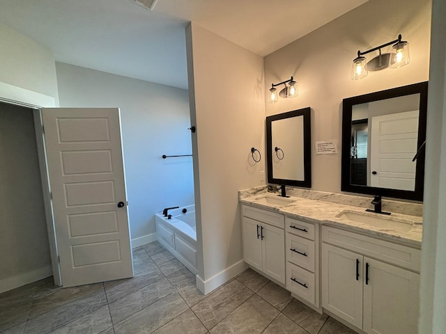 bathroom featuring vanity and a tub to relax in