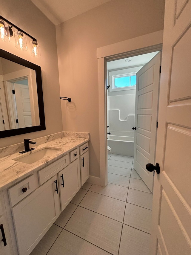 full bathroom with vanity, independent shower and bath, toilet, and tile patterned floors