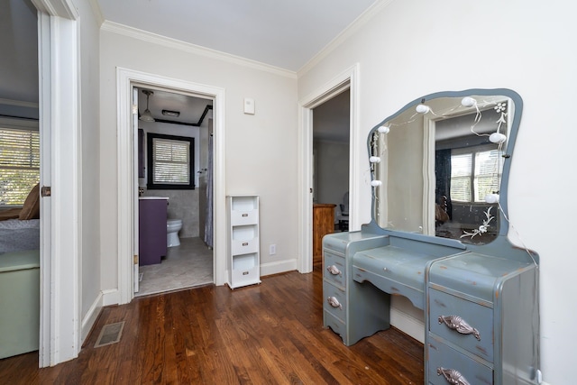 corridor featuring crown molding and dark hardwood / wood-style floors