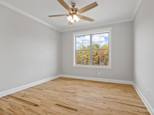 unfurnished room with light hardwood / wood-style floors, ornamental molding, and ceiling fan