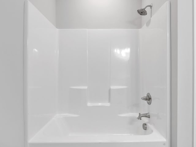 bathroom with shower / bath combination