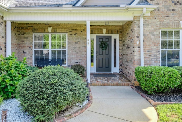 property entrance with covered porch