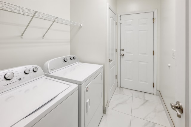 laundry room featuring independent washer and dryer