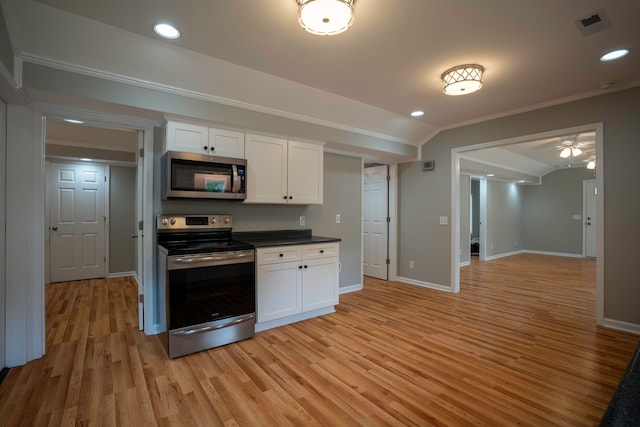 kitchen featuring ceiling fan, stainless steel appliances, light hardwood / wood-style flooring, and white cabinets