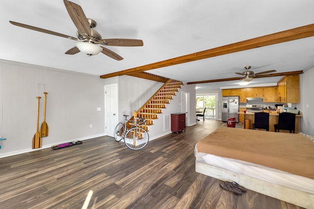 interior space with ornamental molding, dark hardwood / wood-style floors, beamed ceiling, and ceiling fan