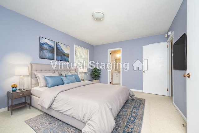 carpeted bedroom featuring ensuite bathroom