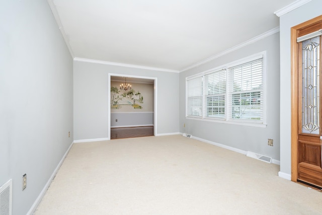 unfurnished room with crown molding, a chandelier, and carpet flooring