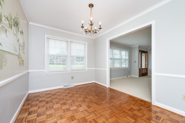 empty room featuring parquet floors, ornamental molding, and an inviting chandelier