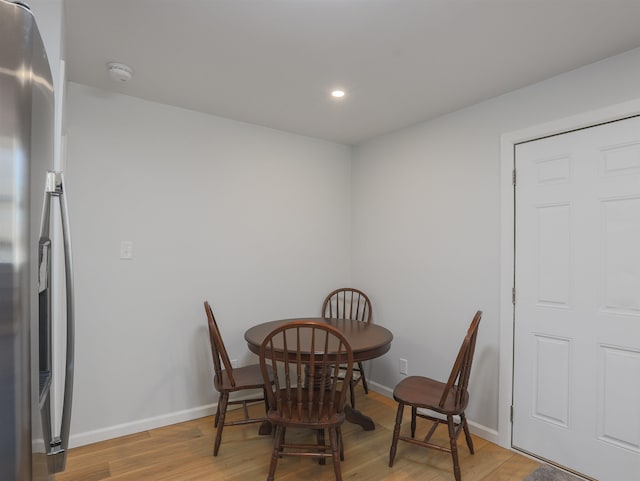 dining room featuring light wood-type flooring