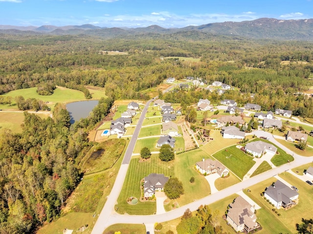 drone / aerial view featuring a mountain view