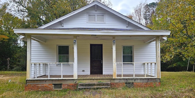 bungalow-style home featuring covered porch