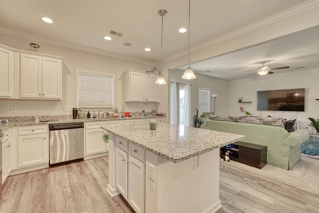 kitchen featuring dishwasher, a kitchen island, decorative light fixtures, white cabinets, and light hardwood / wood-style flooring